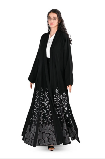A flared abaya with colorful embroidery